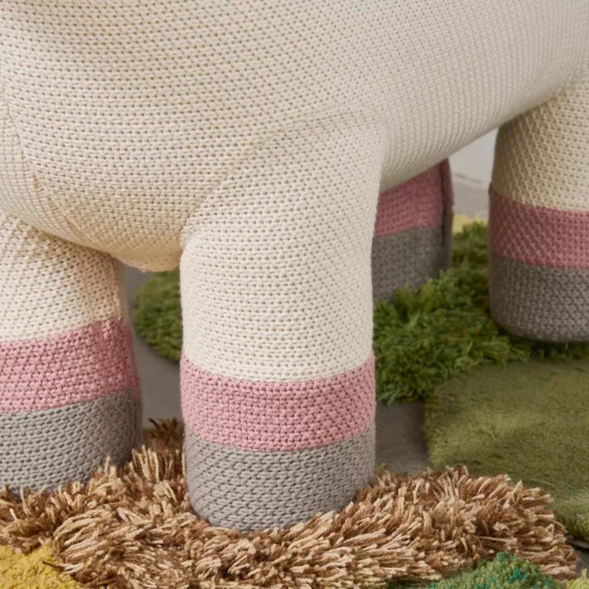 It’s a cat tree, a stylish home decor piece, and even a charming entryway bench.